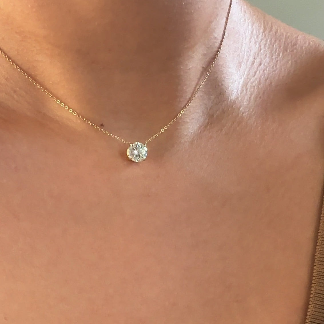 Elevate your look with the classic Diamond Necklace. Featuring a graceful floating lab-grown diamond set in a 4-prong setting for maximum sparkle and brilliance, this exquisite 14k white gold pendant is a classic piece that will bring allure to any ensemble.