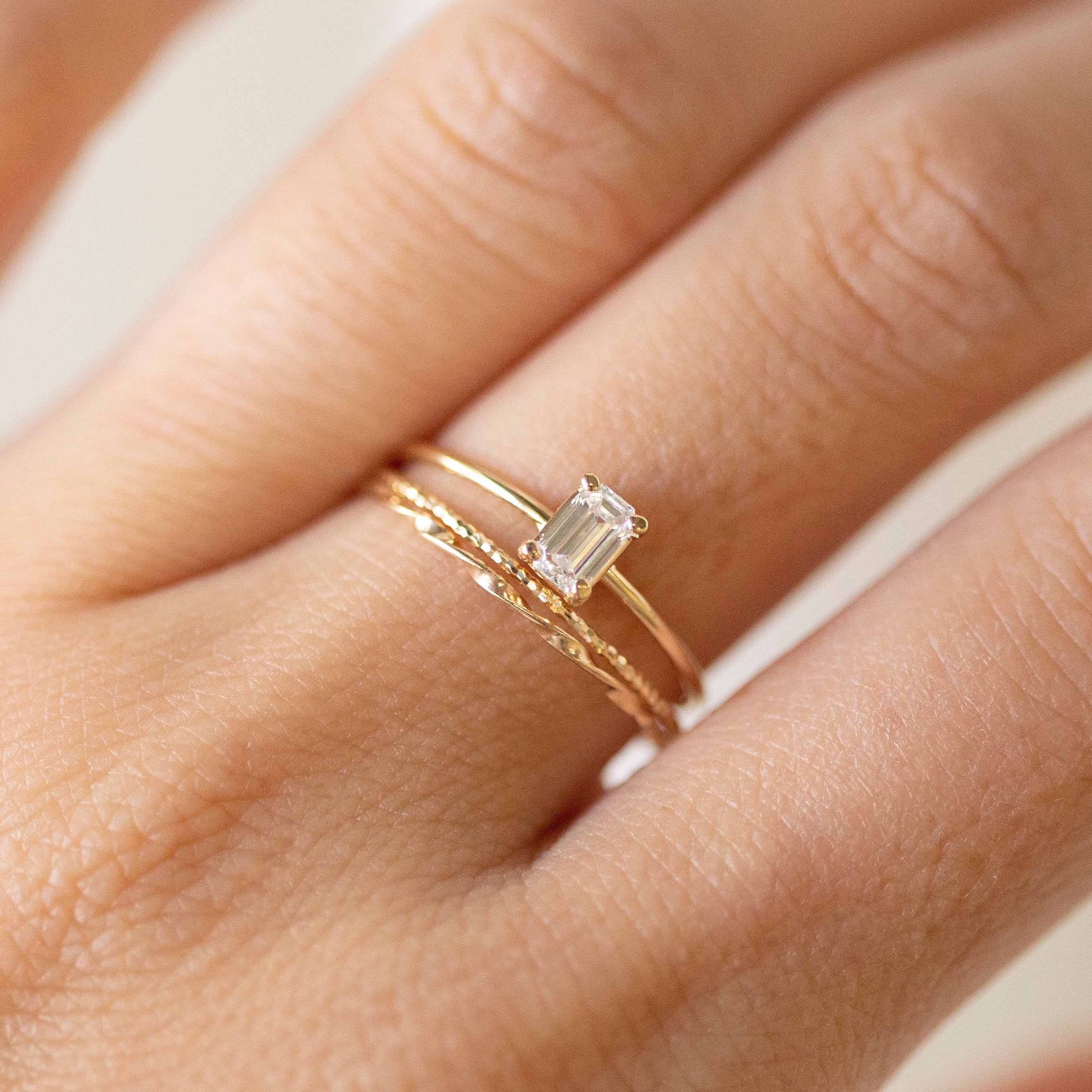 emerald cut dainty diamond ring