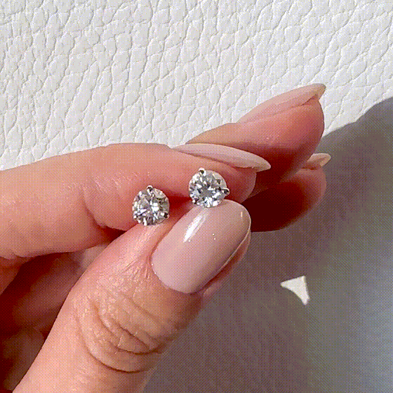 Enhance your elegance with these exquisite 14Kt gold lab diamond earrings, featuring a mesmerizing 1 Ct. TW. Martini set for a touch of sophistication. A must-have staple for every occasion.