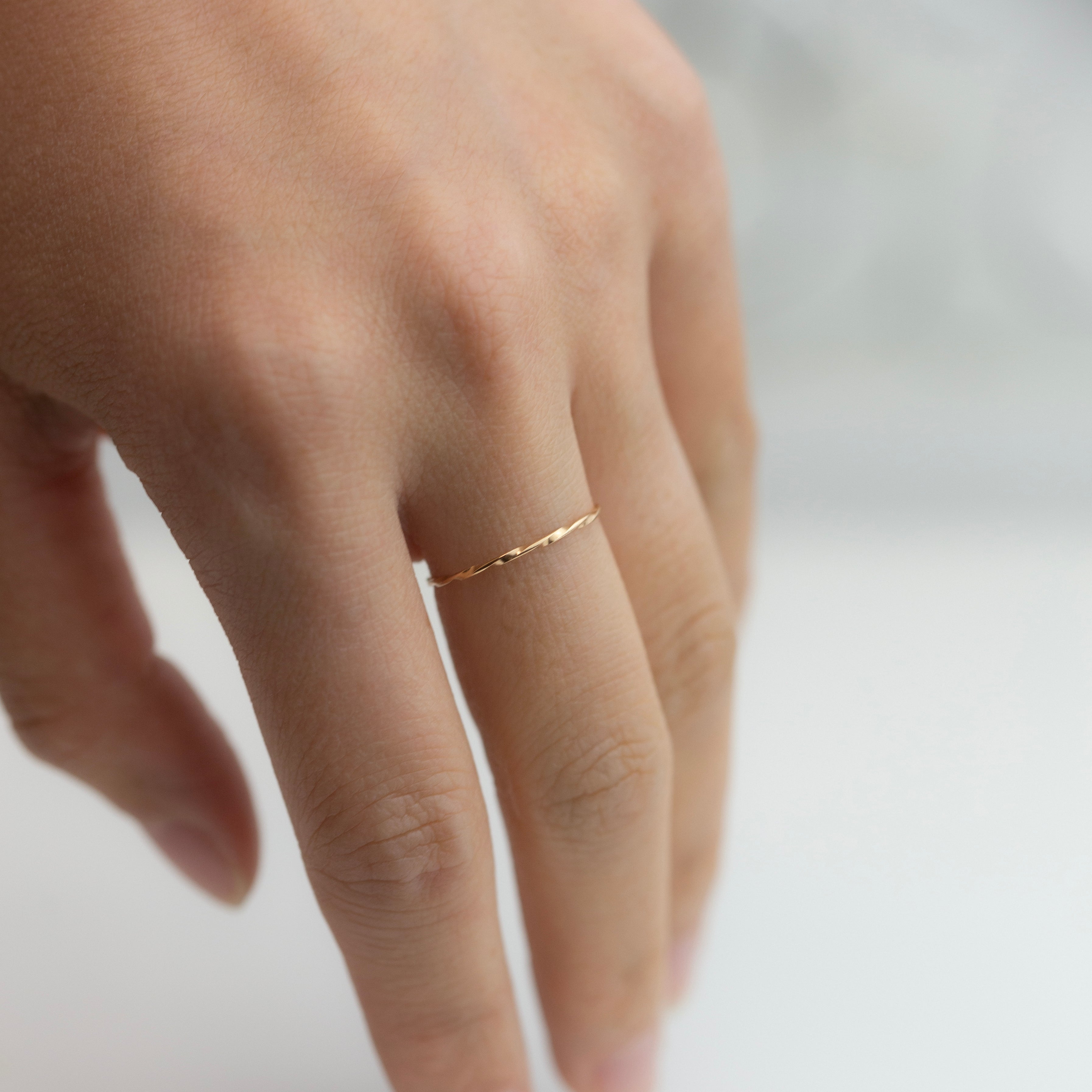 Modern and timeless twisted wire ring. Twisted Stacker Gold Ring -It's a simple and dainty everyday jewelry that adds a tiny sparkle to your finger :) Perfect as a stacking ring or by itself.
