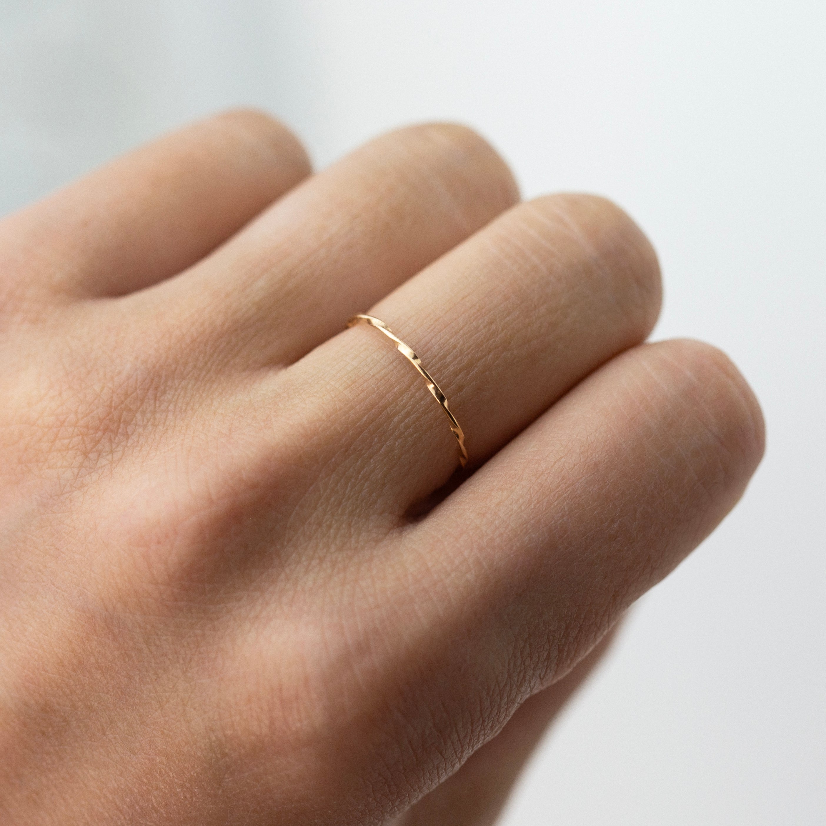 Modern and timeless twisted wire ring. Twisted Stacker Gold Ring -It's a simple and dainty everyday jewelry that adds a tiny sparkle to your finger :) Perfect as a stacking ring or by itself.