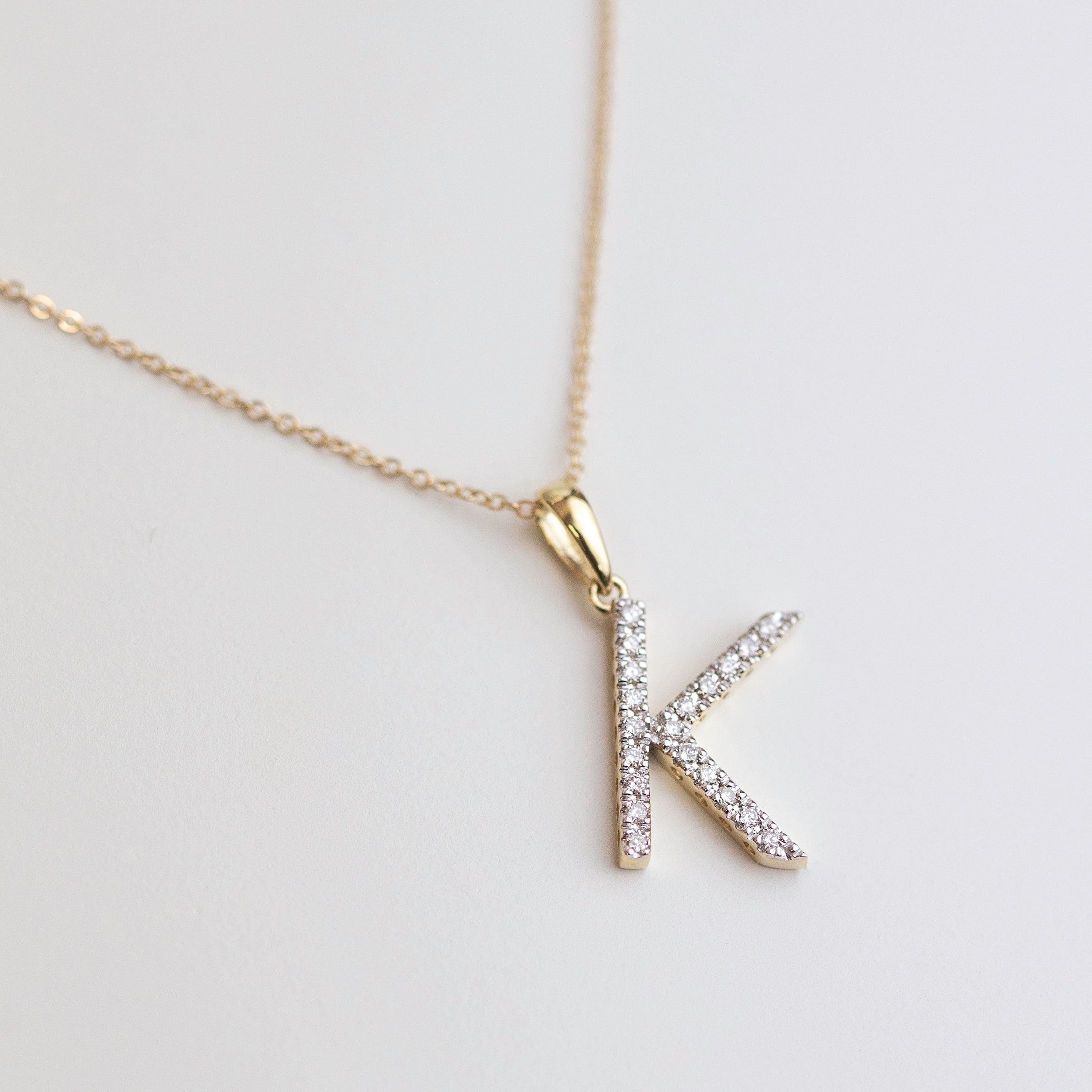 14K Yellow gold medium sized diamond initial charm necklace