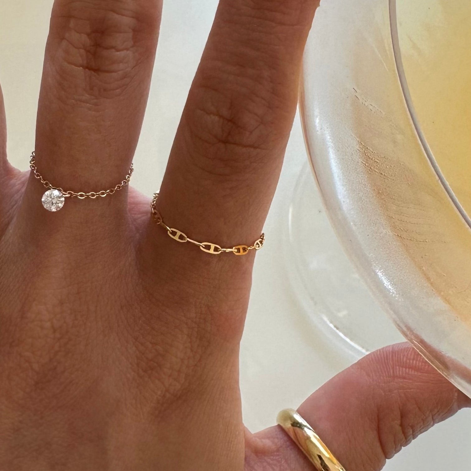 Bare diamond ring and anchor chain ring