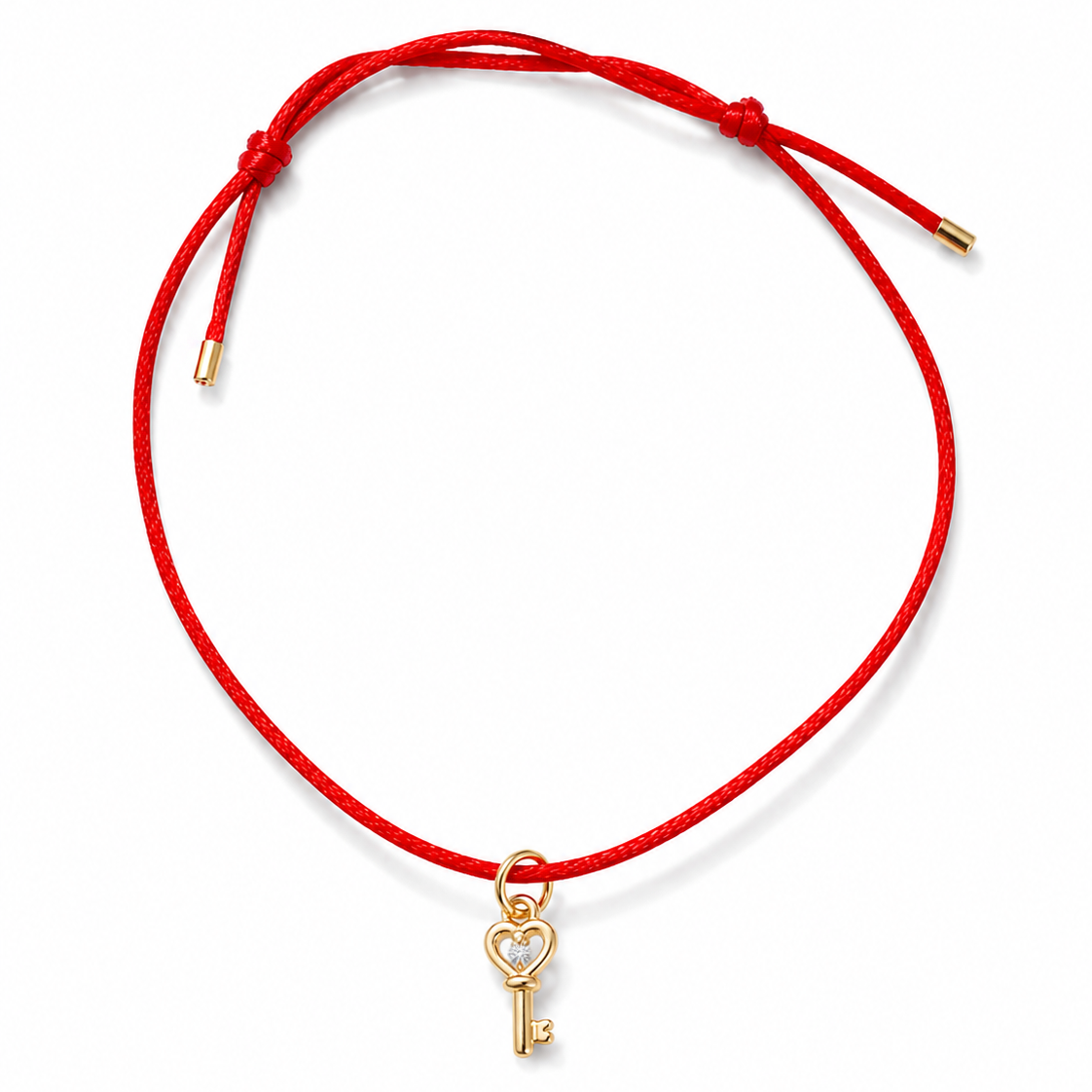 A red adjustable cord bracelet featuring a small gold heart-shaped key charm in the center, displayed on a clean white background.