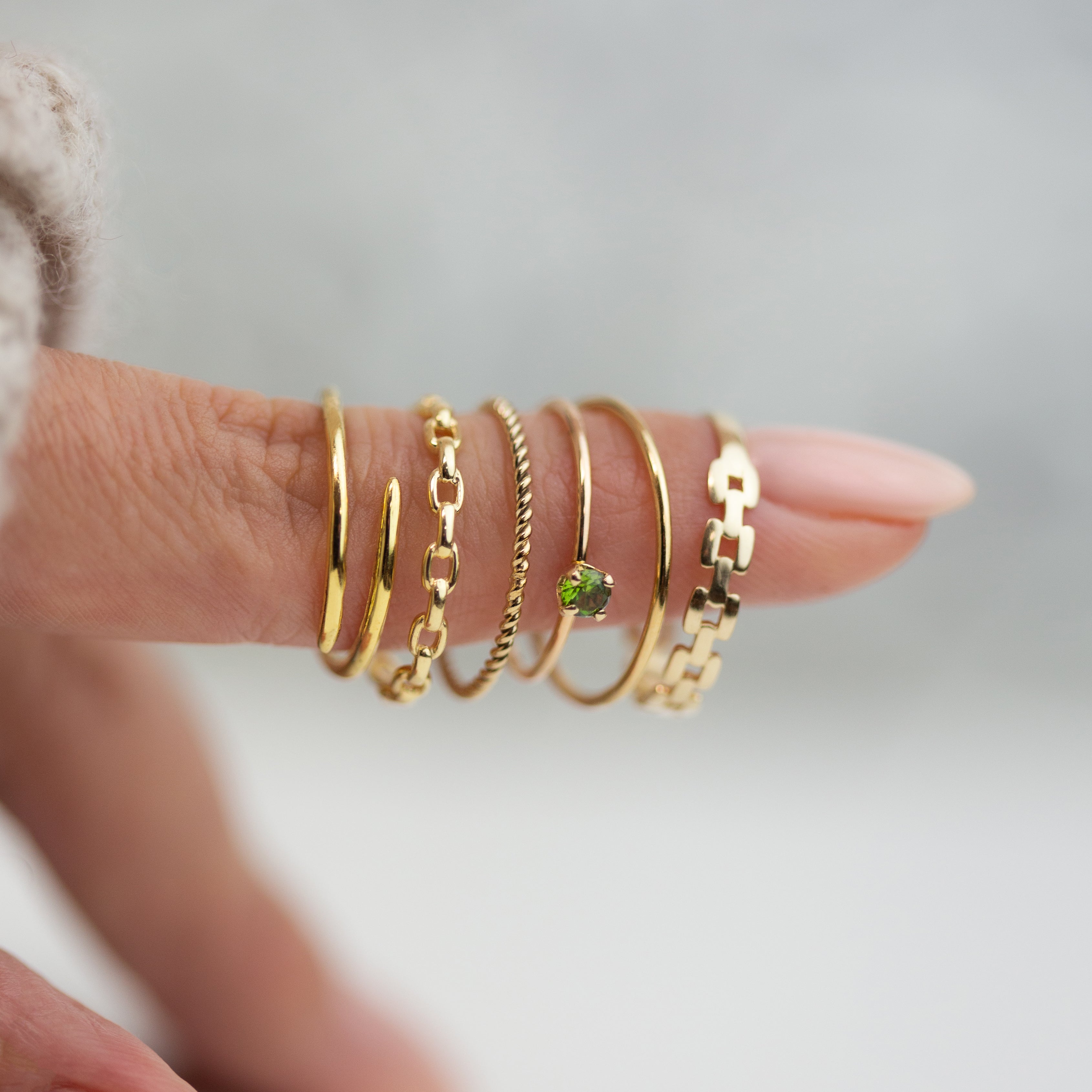 This lustrous 14-karat yellow gold ring is adorned with an open square link design, polished to a brilliant finish. Worn alone, it is a statement of style. When paired with other pieces, it adds a touch of drama to any look.