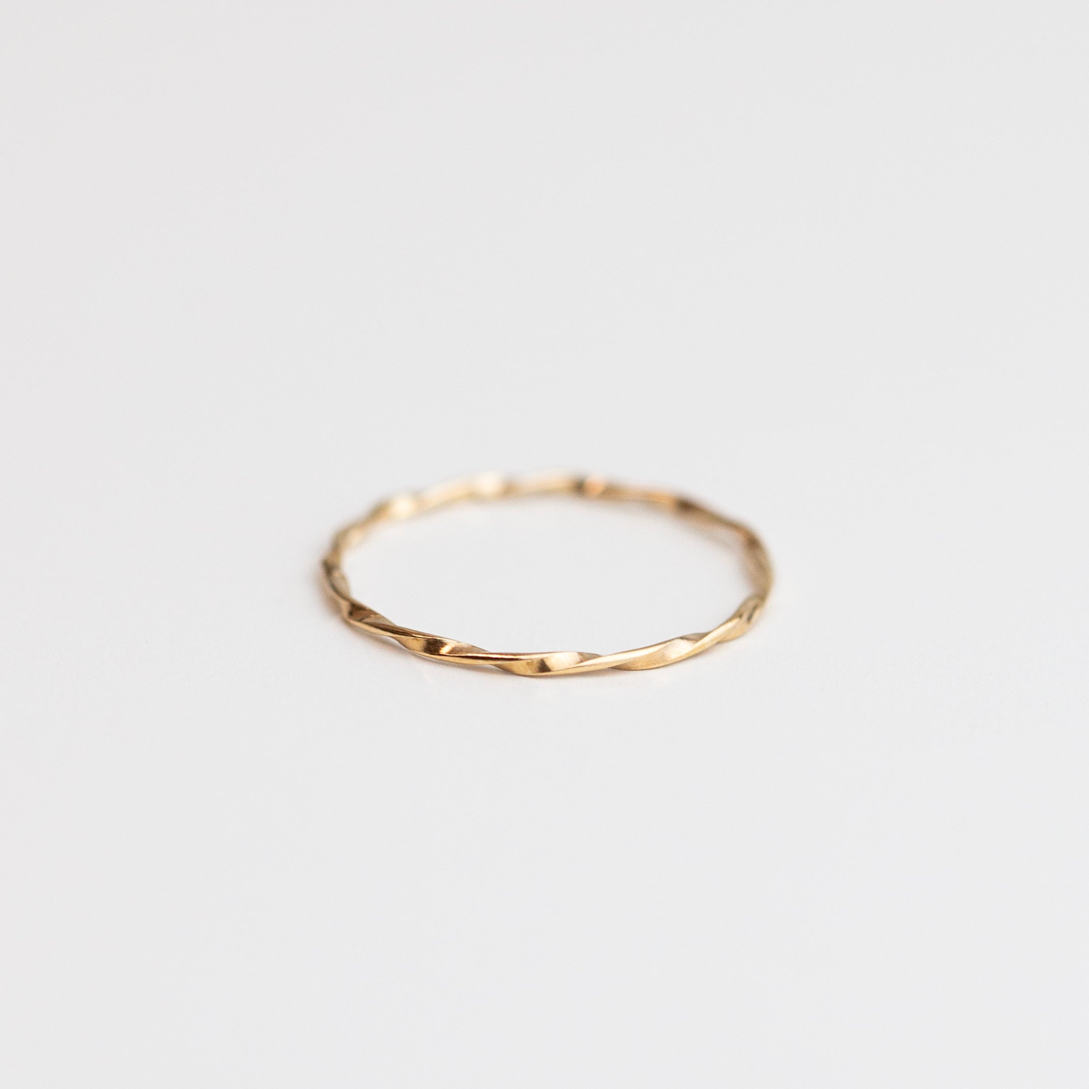 Modern and timeless twisted wire ring. Twisted Stacker Gold Ring -It's a simple and dainty everyday jewelry that adds a tiny sparkle to your finger :) Perfect as a stacking ring or by itself.
