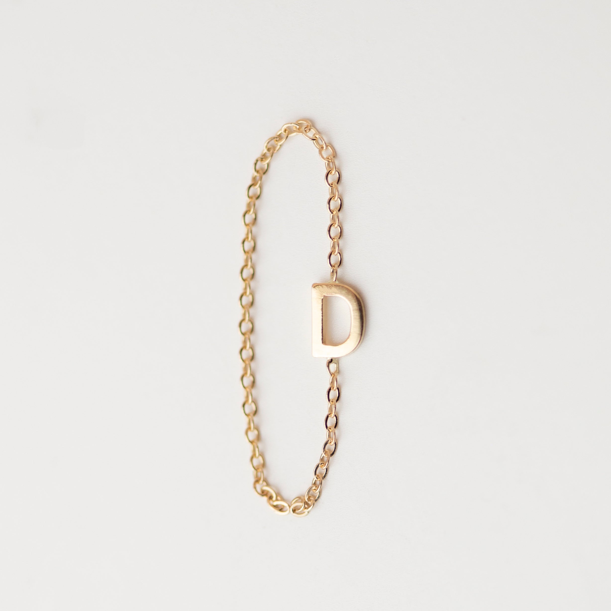 Elegant 14K Monogram Ring: A subtle, dainty 14k gold ring featuring a small monogram for a modern and timeless touch. Luxurious and sophisticated, this delicate chain ring exudes exclusivity.
Simple, minimalist everyday  Initial Ring - Perfect as a stacking ring or by itself.