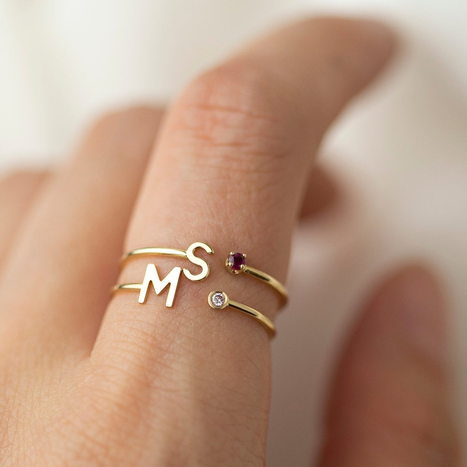 Elevate your style with our exquisite 14k Gold Initial Ring, adorned with a birthstone of your choice. Personalize it with an Uppercase letter A-Z, making it a one-of-a-kind piece. A thoughtful and luxurious gift for yourself or someone special.