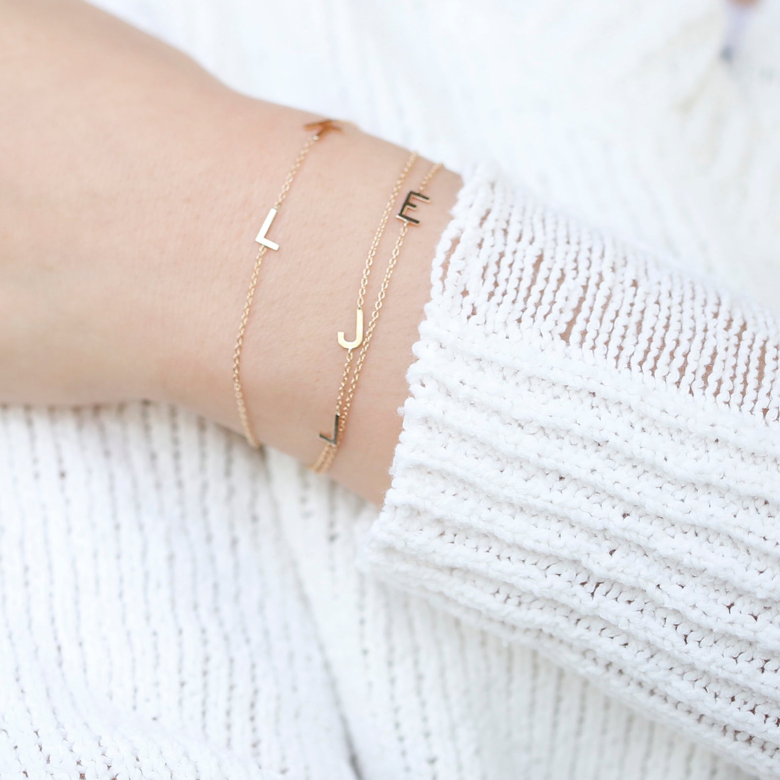 Customize your 14K solid gold initial bracelet. An understated, sleek everyday accessory. Ideal for gifting your loved one.