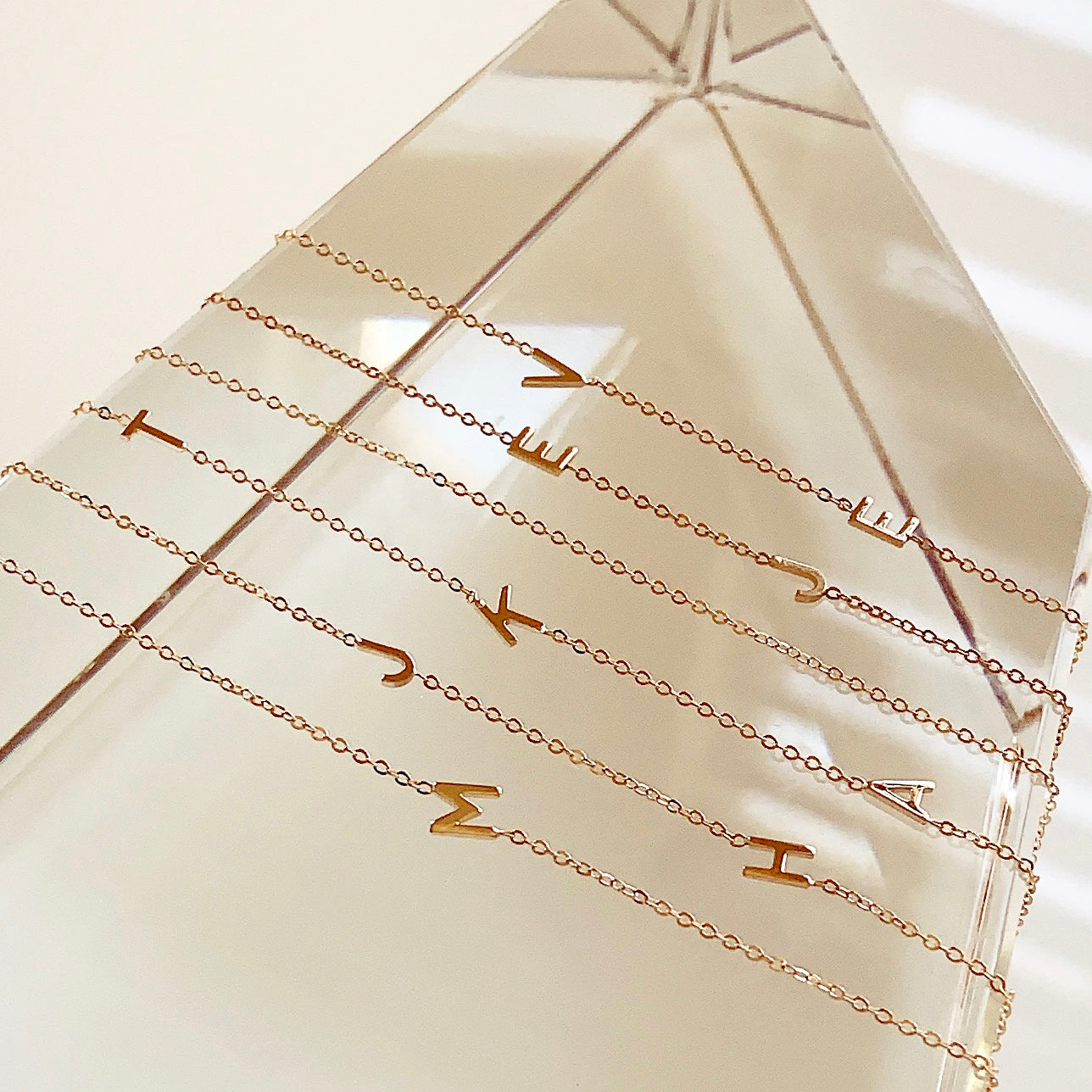 Customize your 14K solid gold initial bracelet. An understated, sleek everyday accessory. Ideal for gifting your loved one.