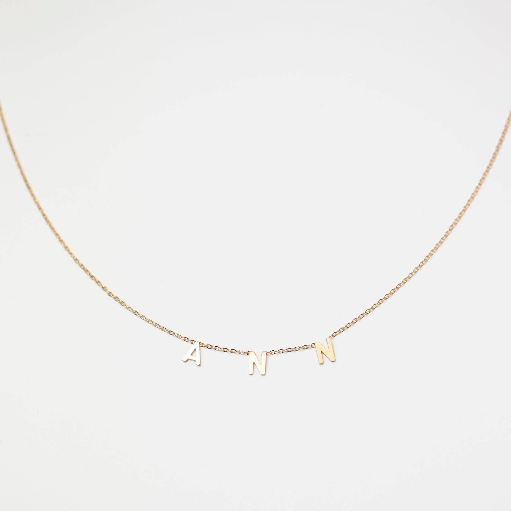 name necklace in 14k gold