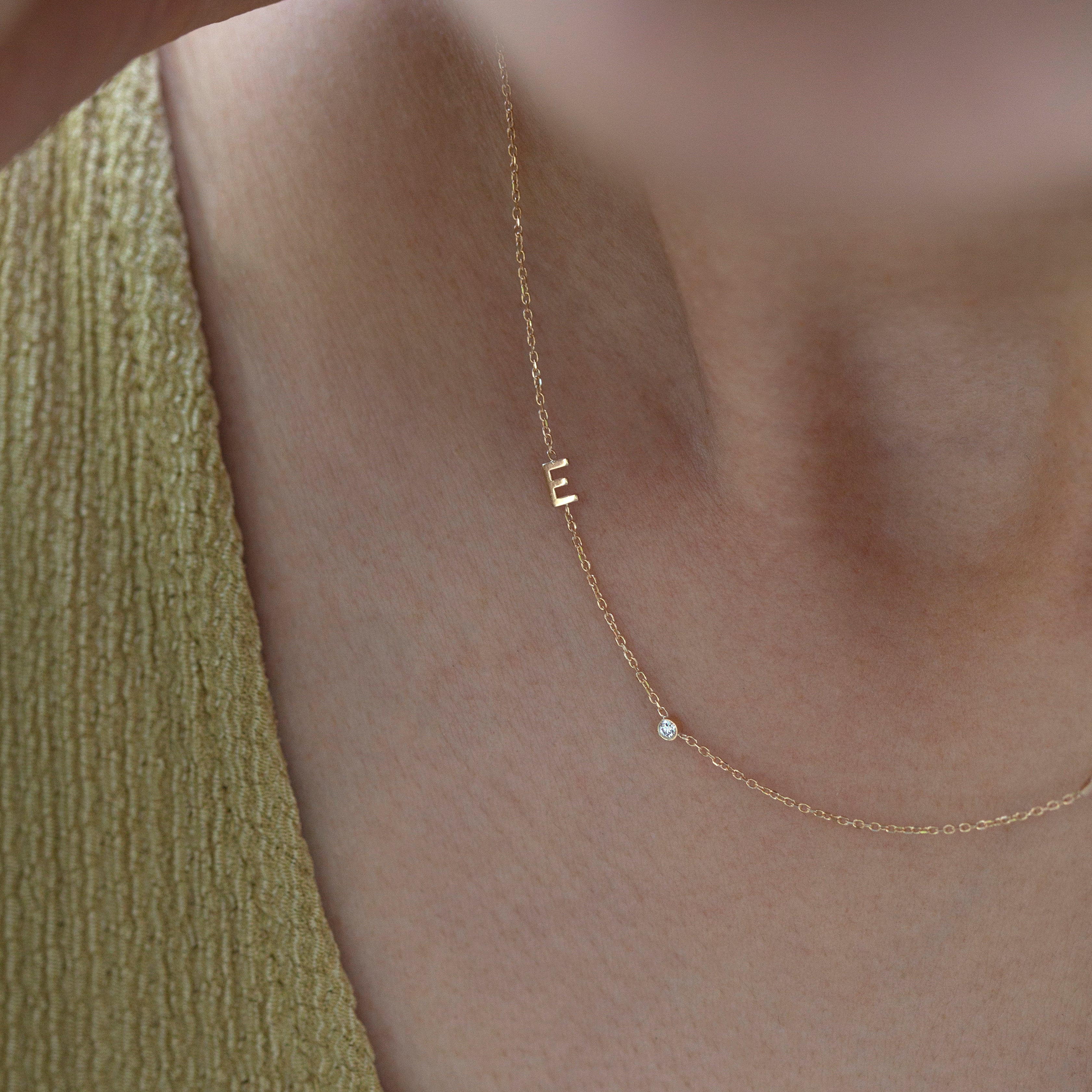 Personalized Asymmetrical 14k solid gold initials necklace with small diamond bezel.