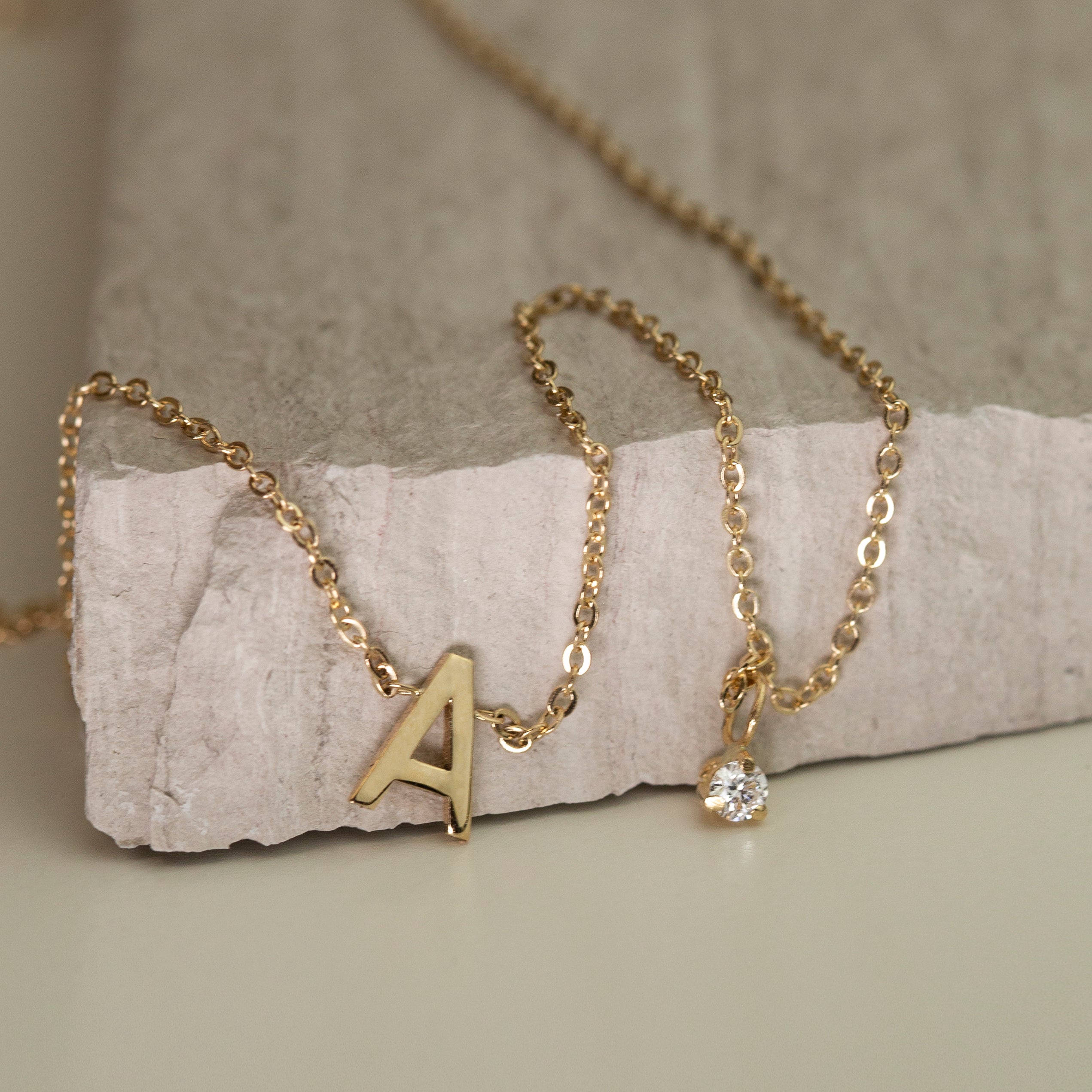 Personalized initial necklace with a diamond dangle