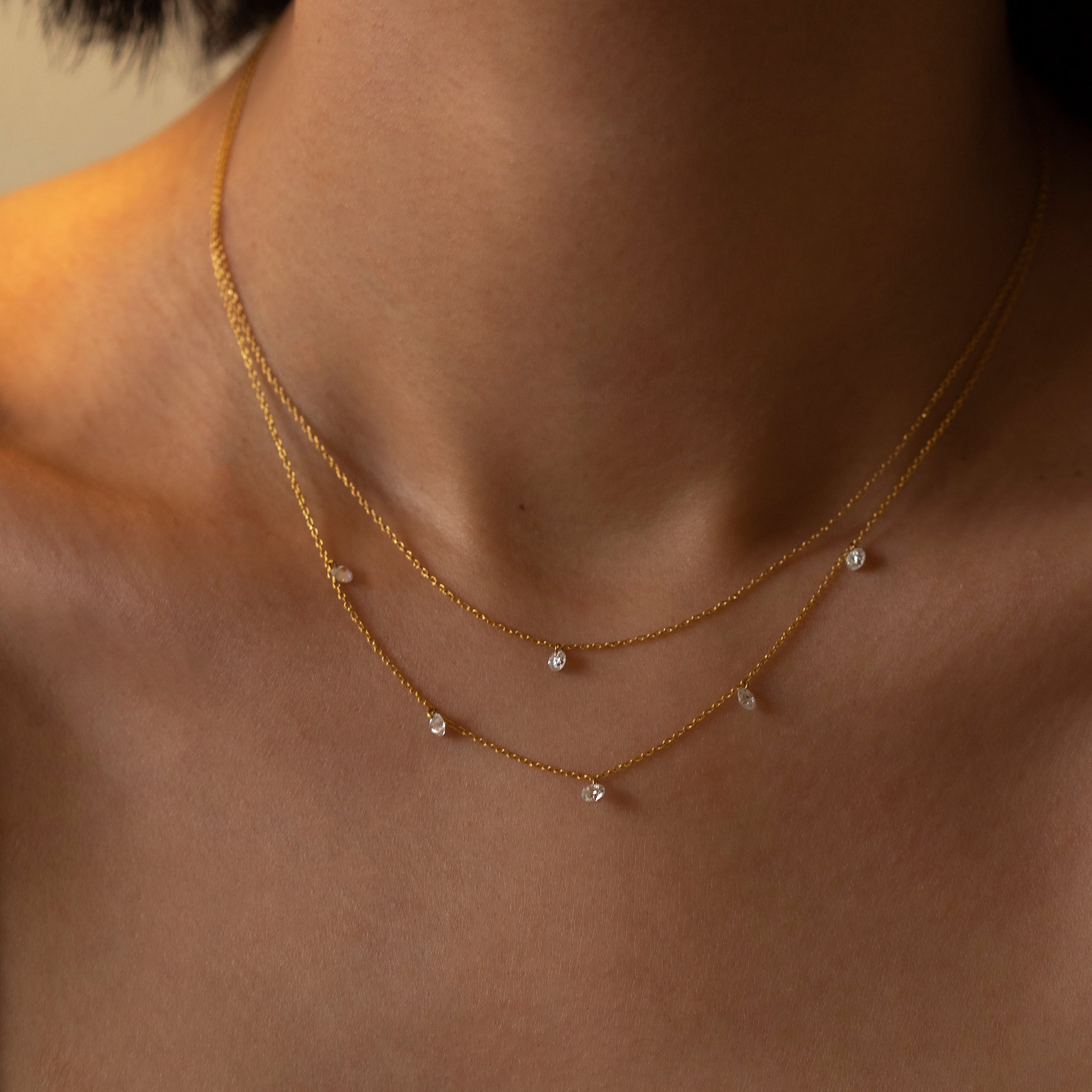 14k Gold chain with beautiful diamond in a drilled jump ring setting