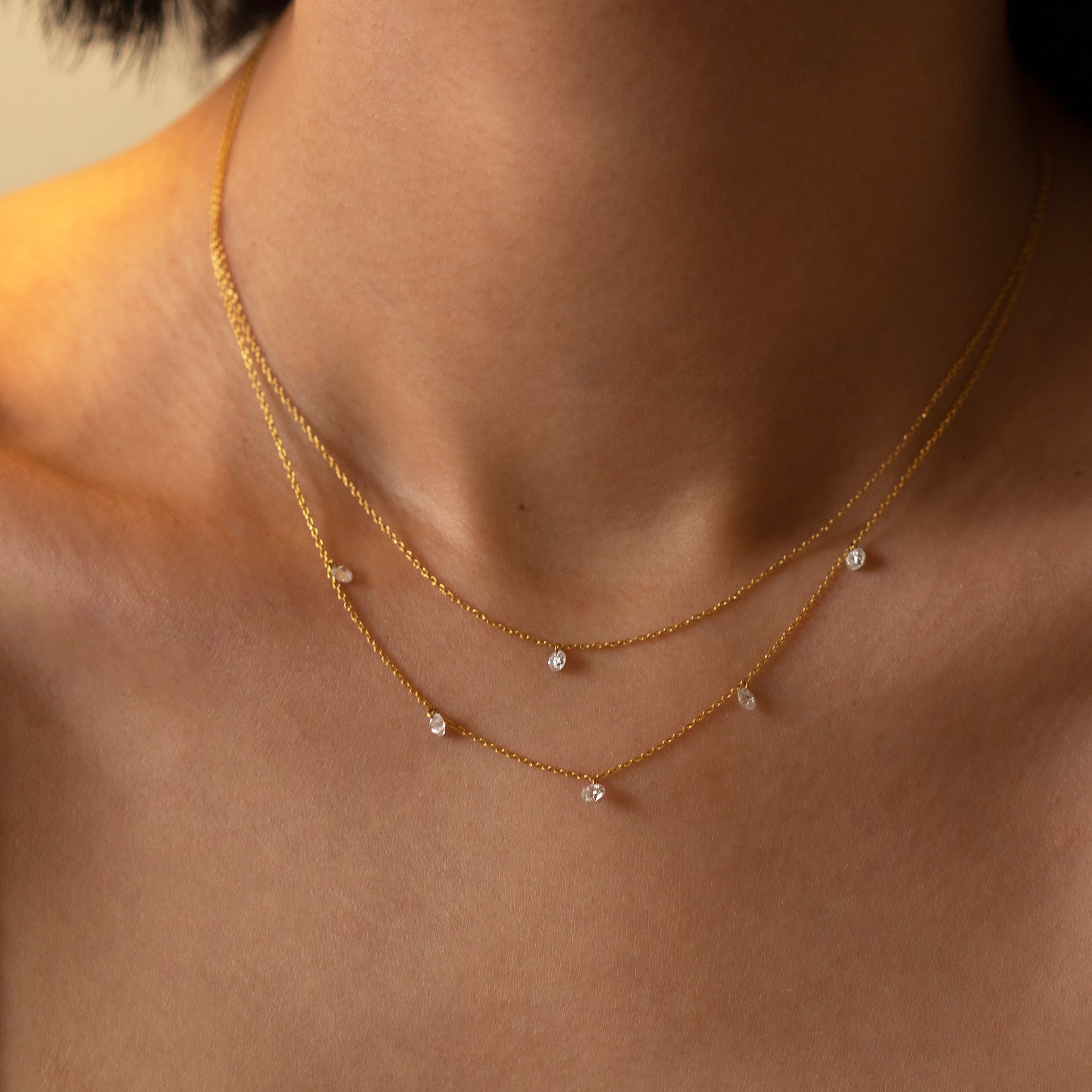 14k Gold chain with beautiful diamond in a drilled jump ring setting