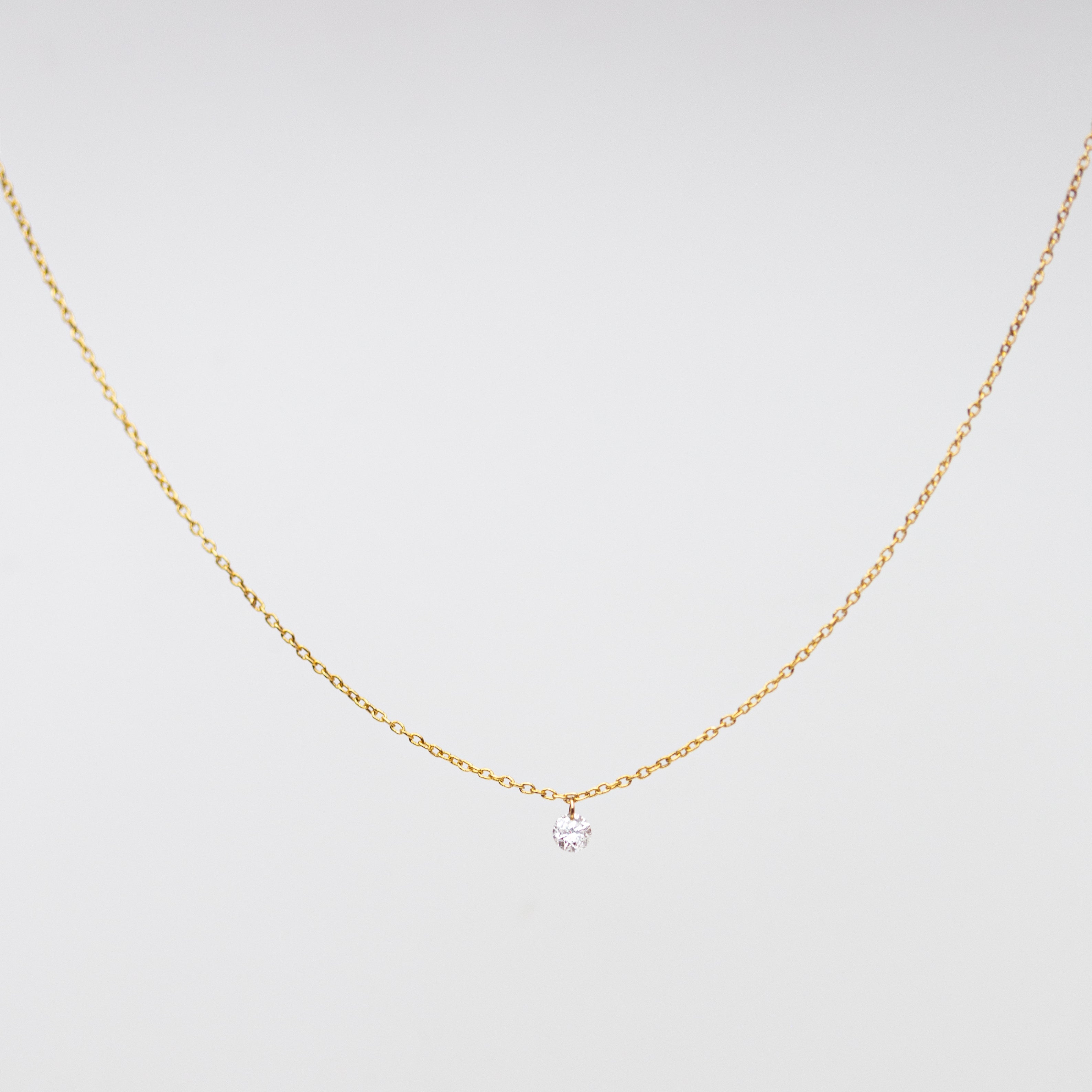 Necklace 14k Gold chain with beautiful diamond in a drilled jump ring setting