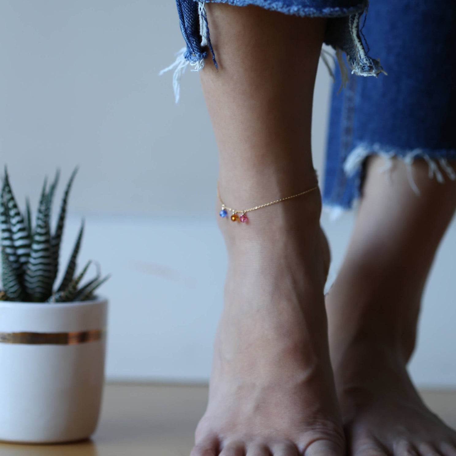 Perfect Gifts for her - Birthstone crystal adds extra personal touch.
This special ankle bracelet is perfect personalized gift for anyone.
Small genuine Swarovski birthstone crystals dangle
from beautiful 14K gold filled or sterling silver shinny chain.