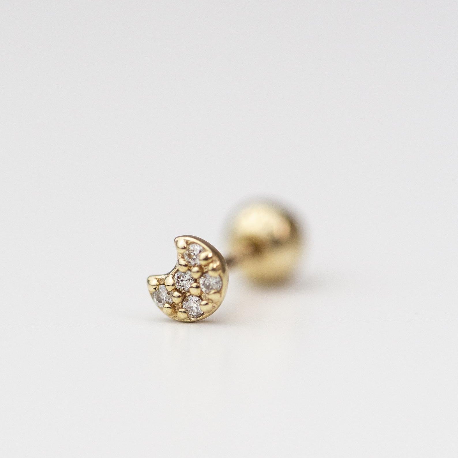 14K Yellow Gold crescent moon stud earring
Can be worn as stud for Cartilage.
Minimalist, high quality, and timeless.
Very secure and comfortable to wear.