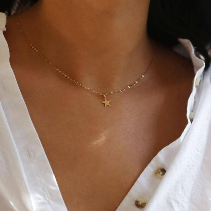 dainty star charm necklace in 14k gold
