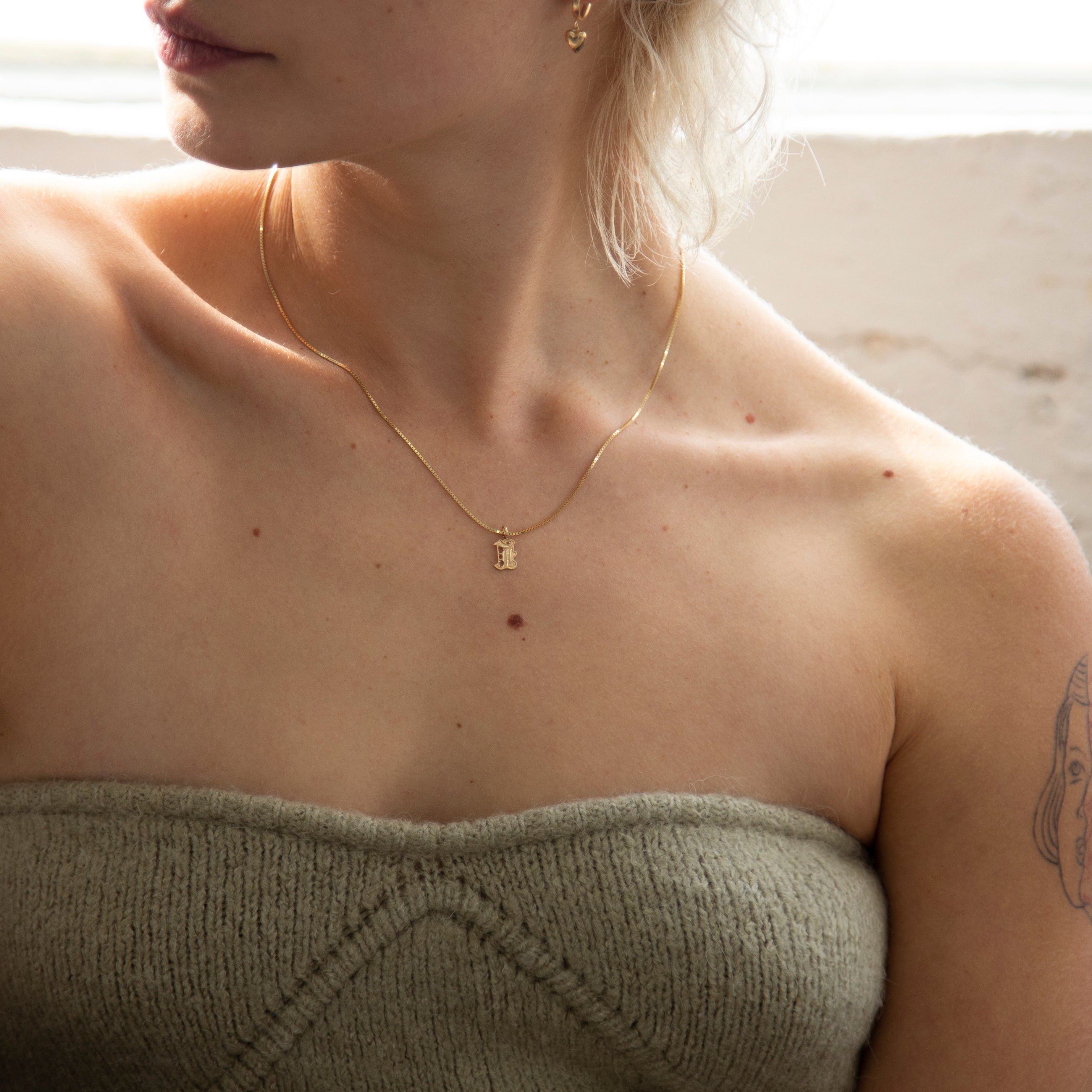 This Old english initial necklace is the perfect combination of edgy and elegant to make a unique statement.