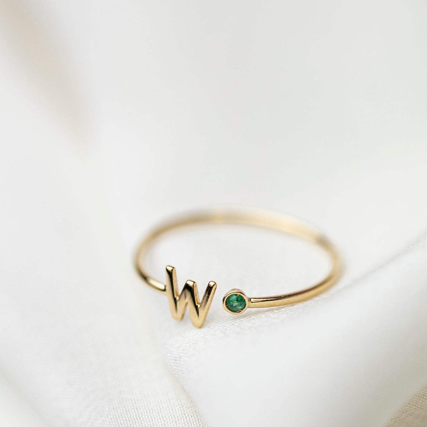 Elevate your style with our exquisite 14k Gold Initial Ring, adorned with a birthstone of your choice. Personalize it with an Uppercase letter A-Z, making it a one-of-a-kind piece. A thoughtful and luxurious gift for yourself or someone special.