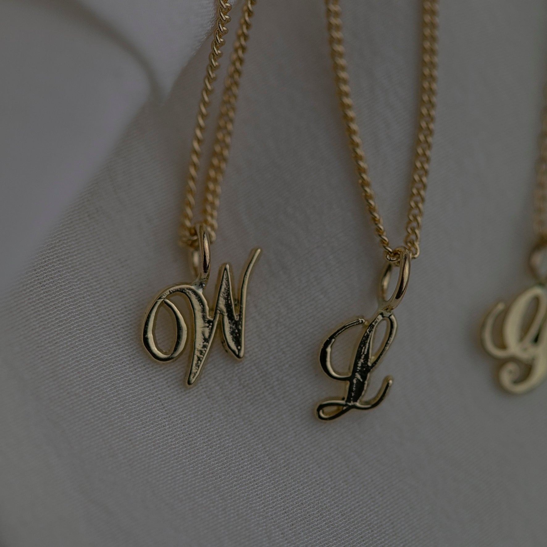 Gold initial necklaces