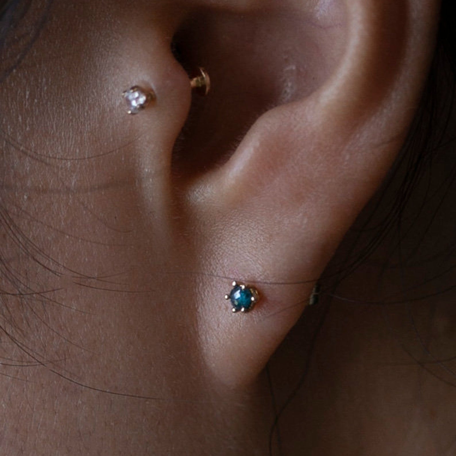 Gold Blue Rough Cut Diamond Solitaire Stud Earrings in 14k Gold.
