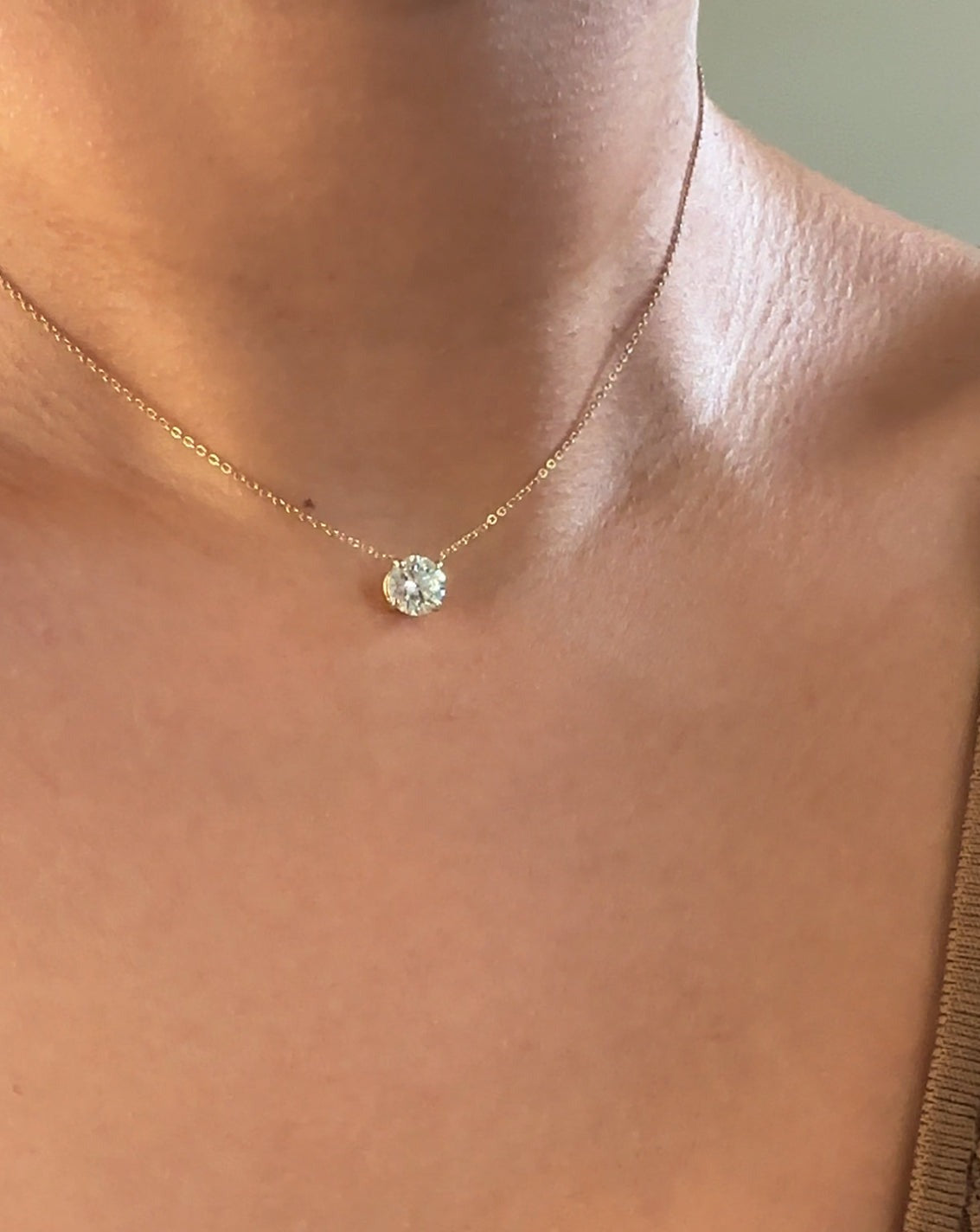 Elevate your look with the classic Diamond Necklace. Featuring a graceful floating lab-grown diamond set in a 4-prong setting for maximum sparkle and brilliance, this exquisite 14k white gold pendant is a classic piece that will bring allure to any ensemble.