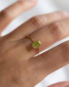 The octagon-shaped peridot on this ring is both eye-catching and elegantly simplistic. It is the perfect way to celebrate a special August birthday or simply adorn oneself with its stunning light green hue.