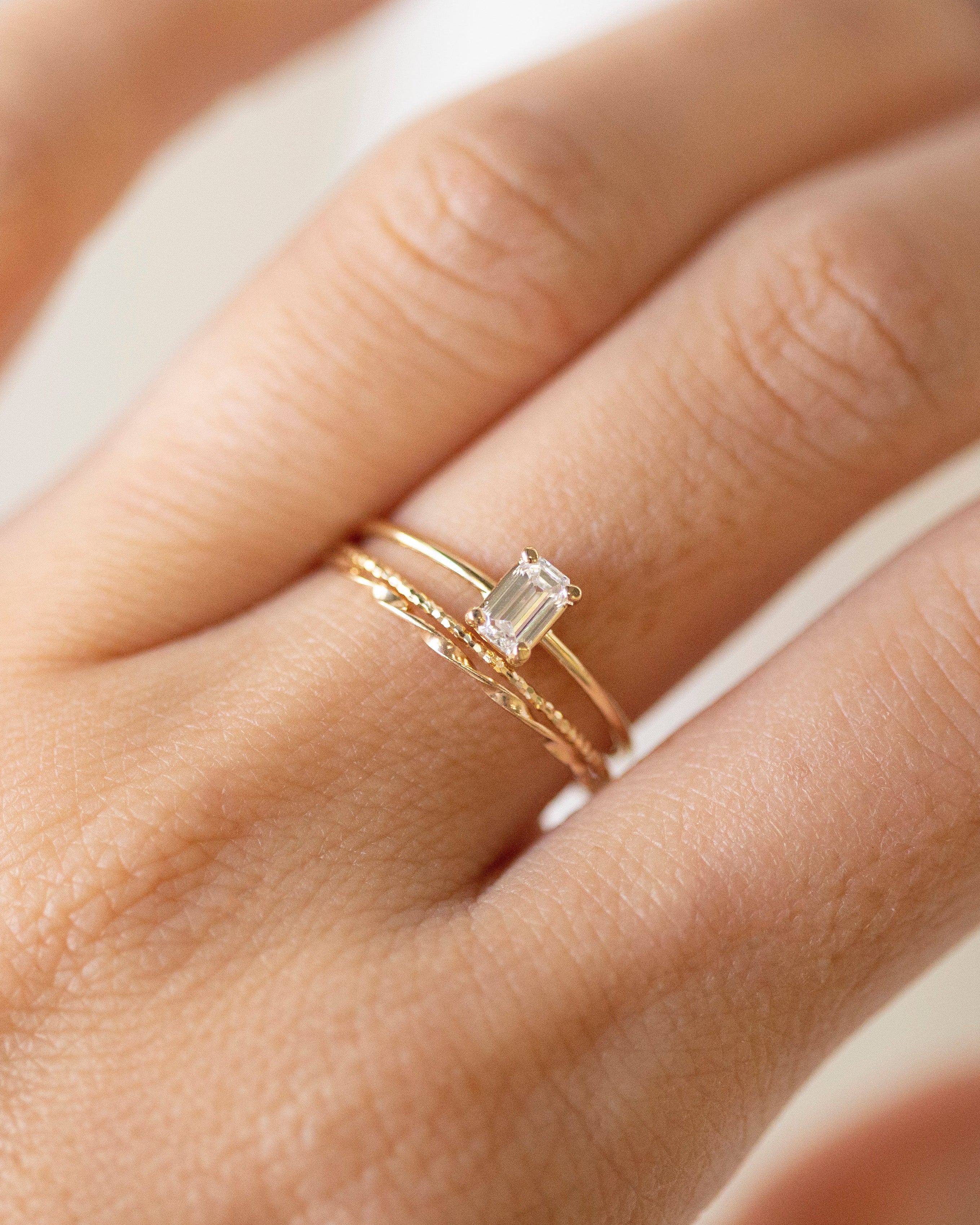 emerald cut dainty diamond ring