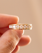 14K yellow gold channel set ring featuring 10 round brilliant lab-grown diamonds on a clean white background.