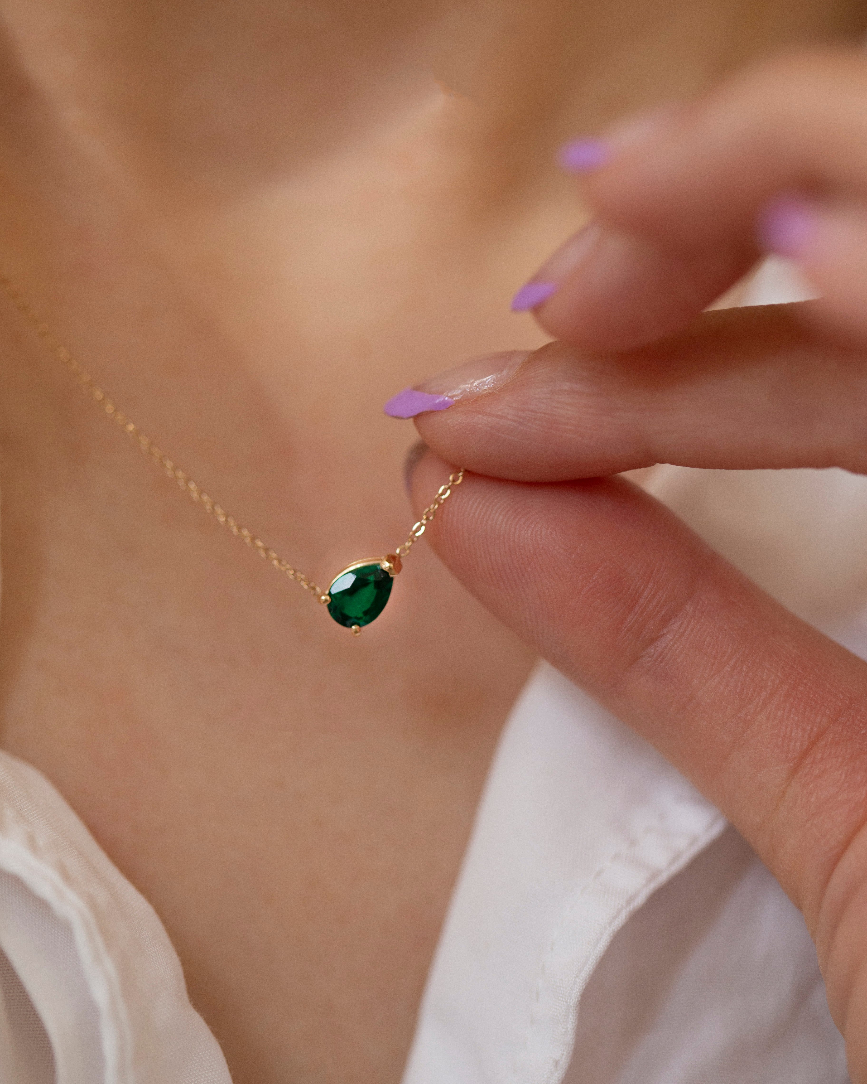 Pear shape Emerald Solitaire necklace in 14k Gold
Prettiest green. 