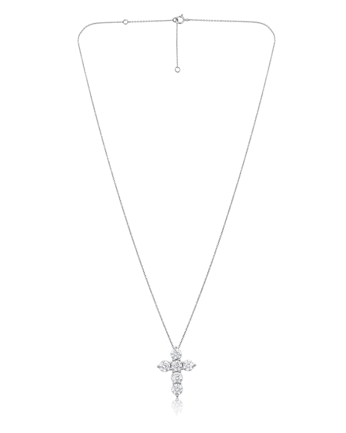 A silver-toned cross pendant necklace with clear stones, displayed on a clean white background.