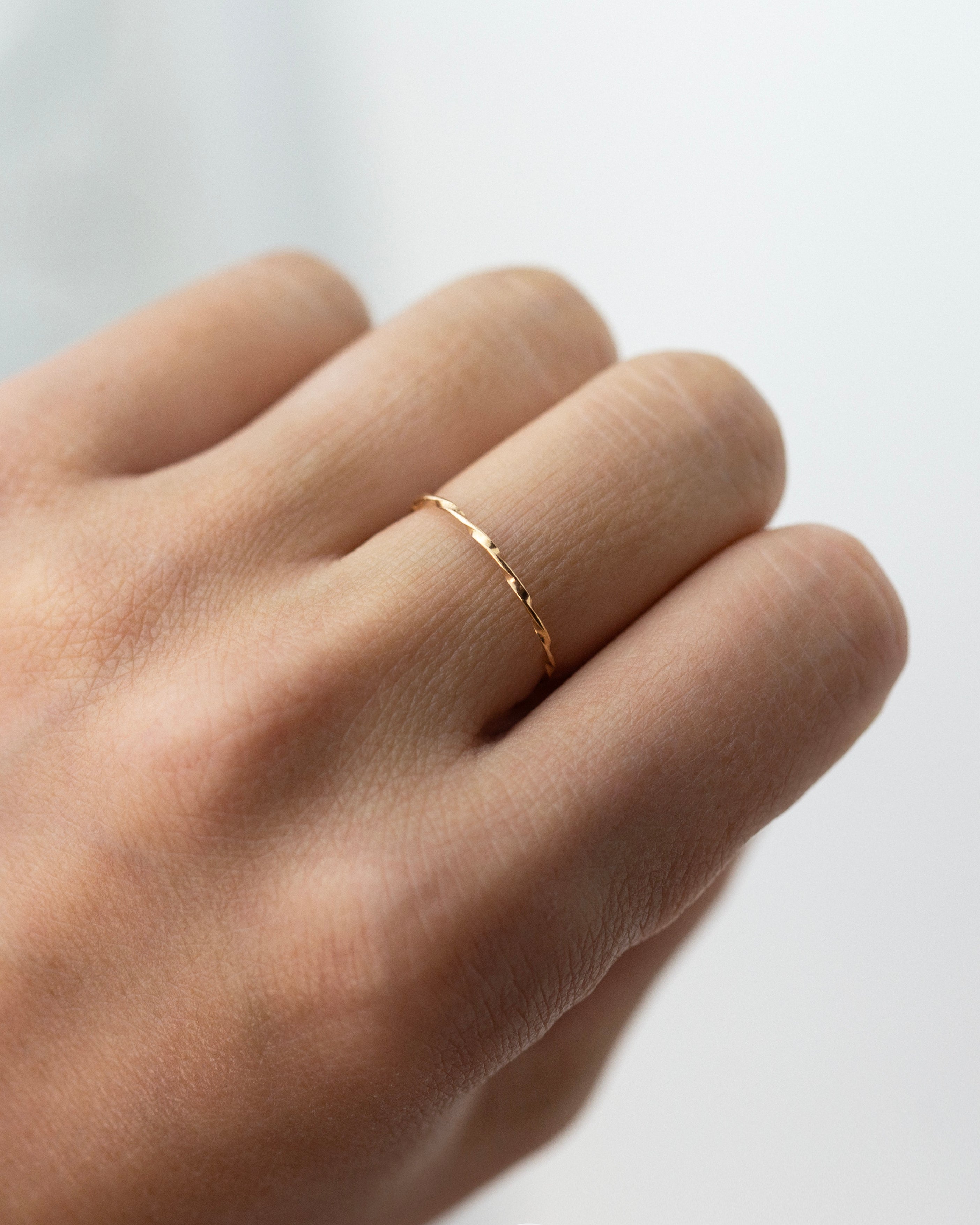 Modern and timeless twisted wire ring. Twisted Stacker Gold Ring -It's a simple and dainty everyday jewelry that adds a tiny sparkle to your finger :) Perfect as a stacking ring or by itself.