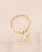 Barely there ring in 14k gold with small initial letter