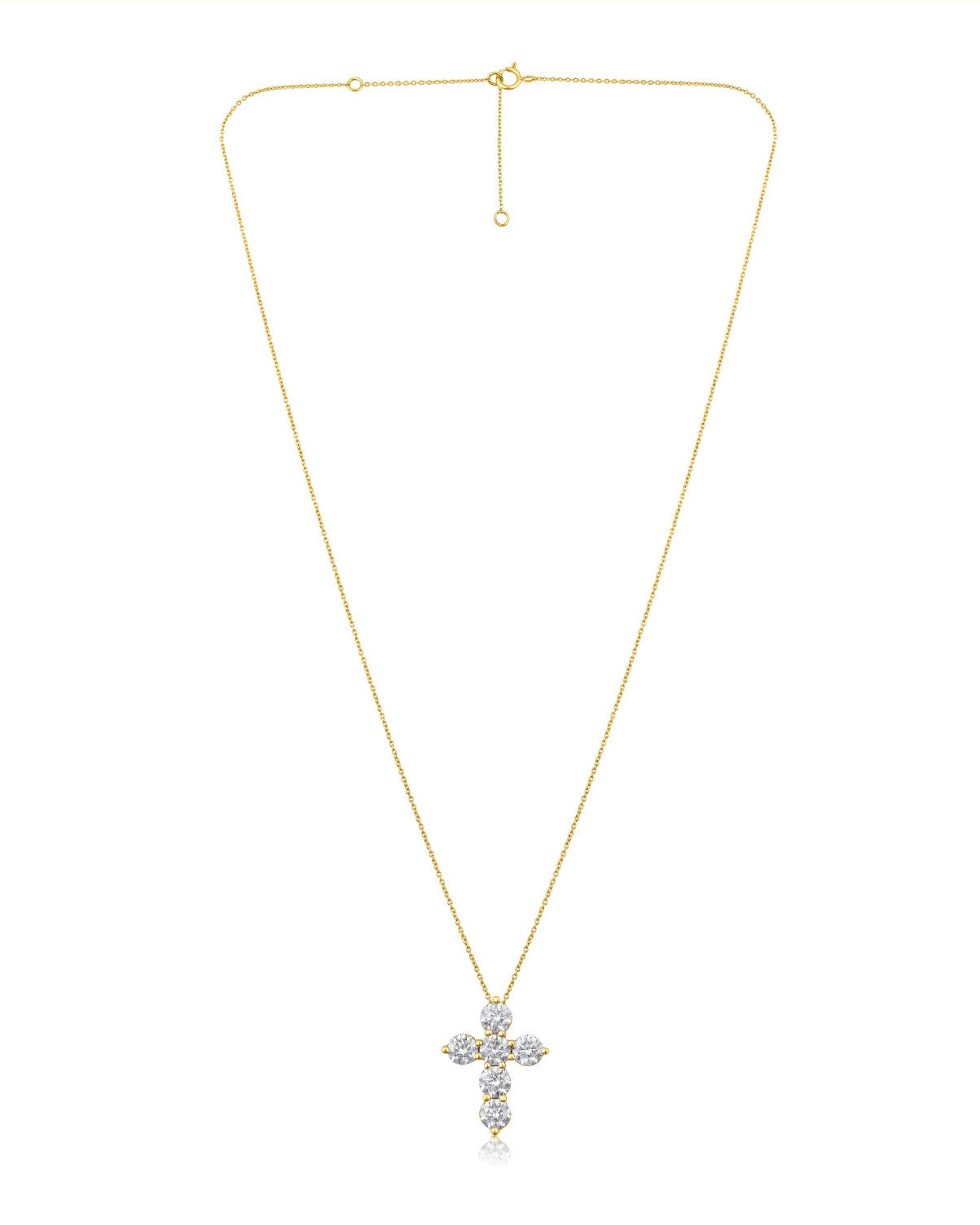 A delicate gold chain necklace featuring a cross pendant encrusted with clear stones, displayed against a solid white background.