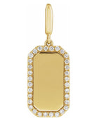 A gold rectangular pendant charm with a smooth blank center and a border of small clear stones, shown on a plain white background.