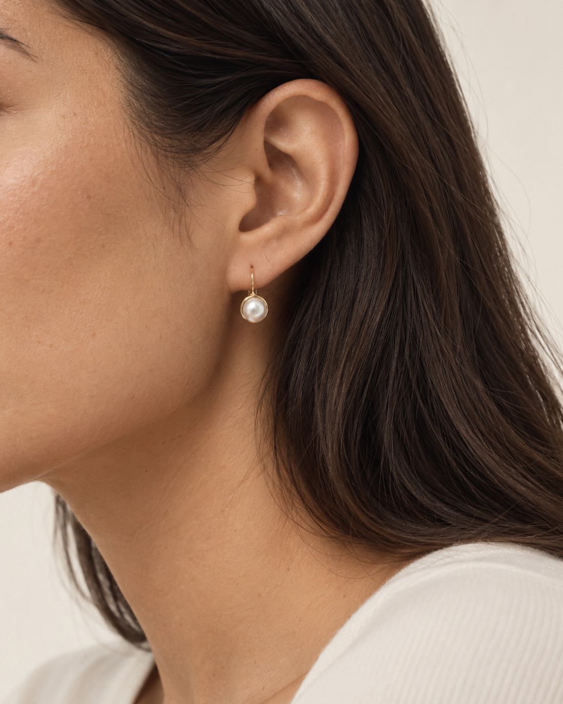pearl lever back earring on a model