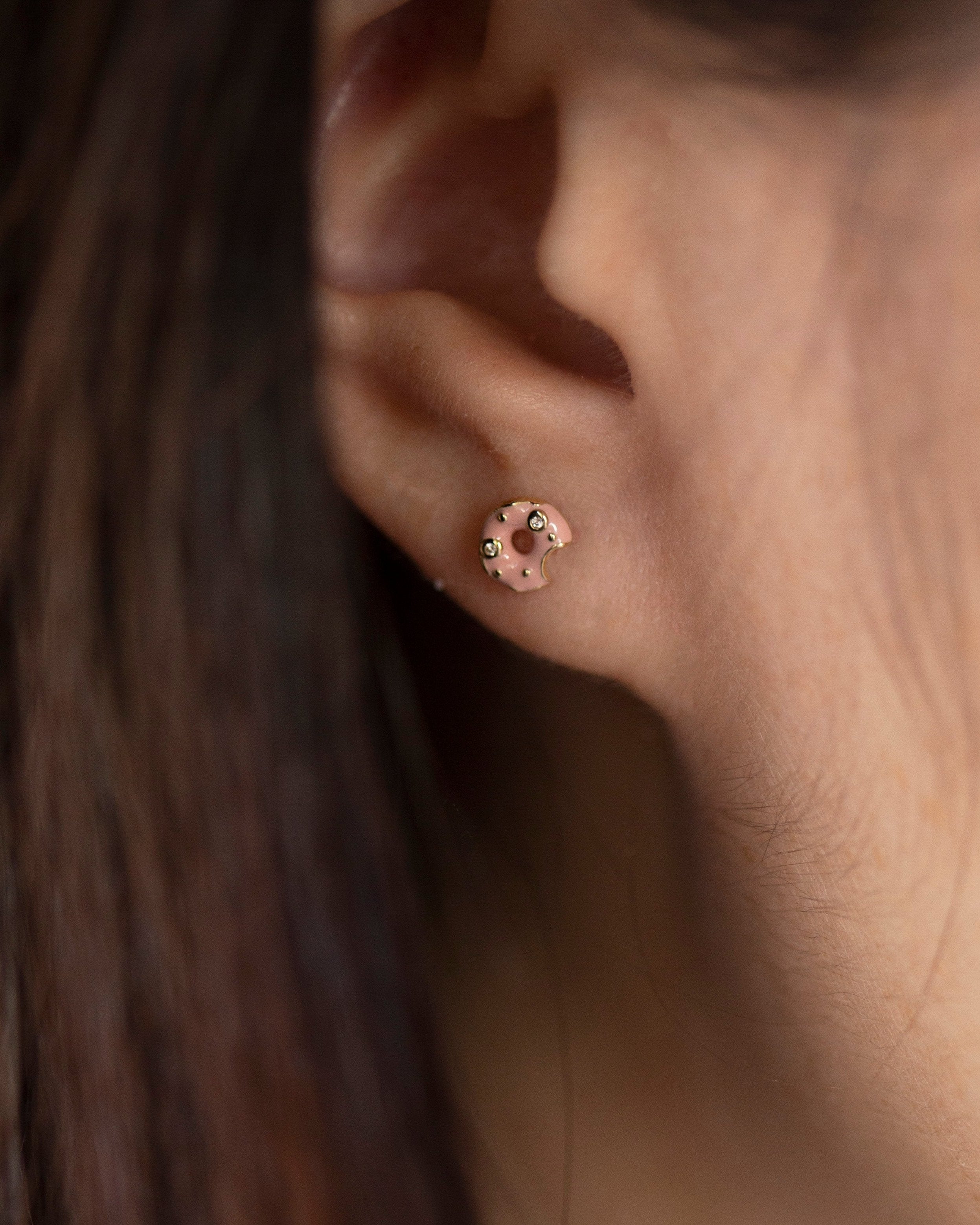 Elevate your style with these 14k diamond and enamel donut post earrings, crafted with brilliant diamond sprinkles and pink enamel frosting.&nbsp;