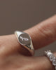 signet ring with personalized monogram engraving