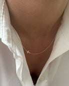 sideway cross necklace