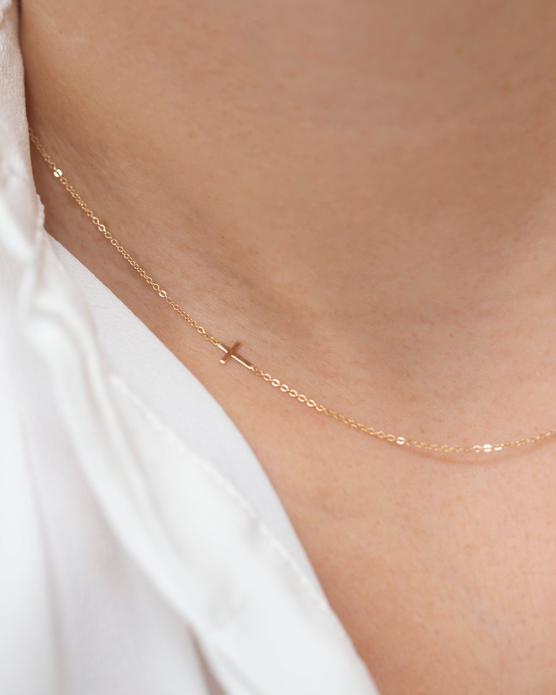 14k Gold Dainty Sideway Cross – E&E PROJECT