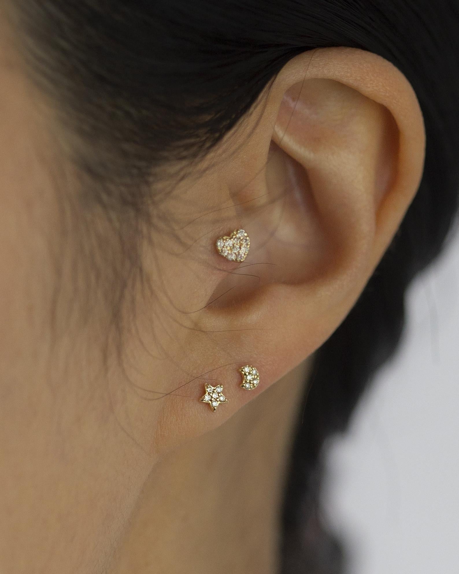 14K Yellow Gold crescent moon stud earring
Can be worn as stud for Cartilage.

Minimalist, high quality, and timeless.
Very secure and comfortable to wear.