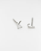 14K Initial stud Earrings - Enhance your style with a touch of sophistication and elegance using our 14K Solid Gold Initial Stud Earrings. Show off your initial and elevate your look with this exquisite accessory. Can be worn alone or paired with other earrings to create a stylish ear stack.