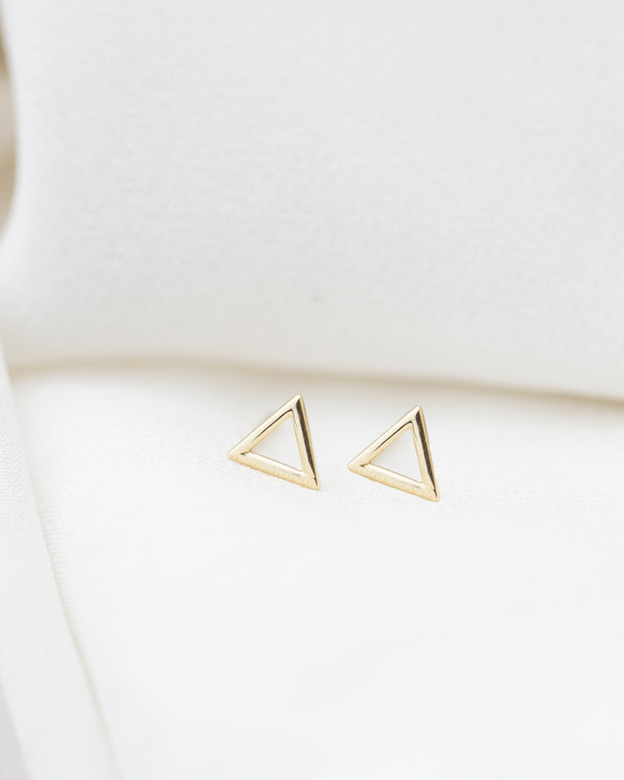 These small triangle stud earrings are one of our geometric shape series that will be perfect for everyday wear.