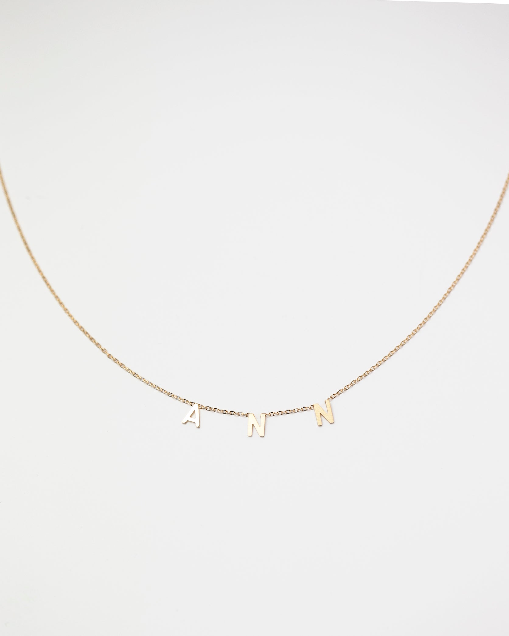 name necklace in 14k gold 