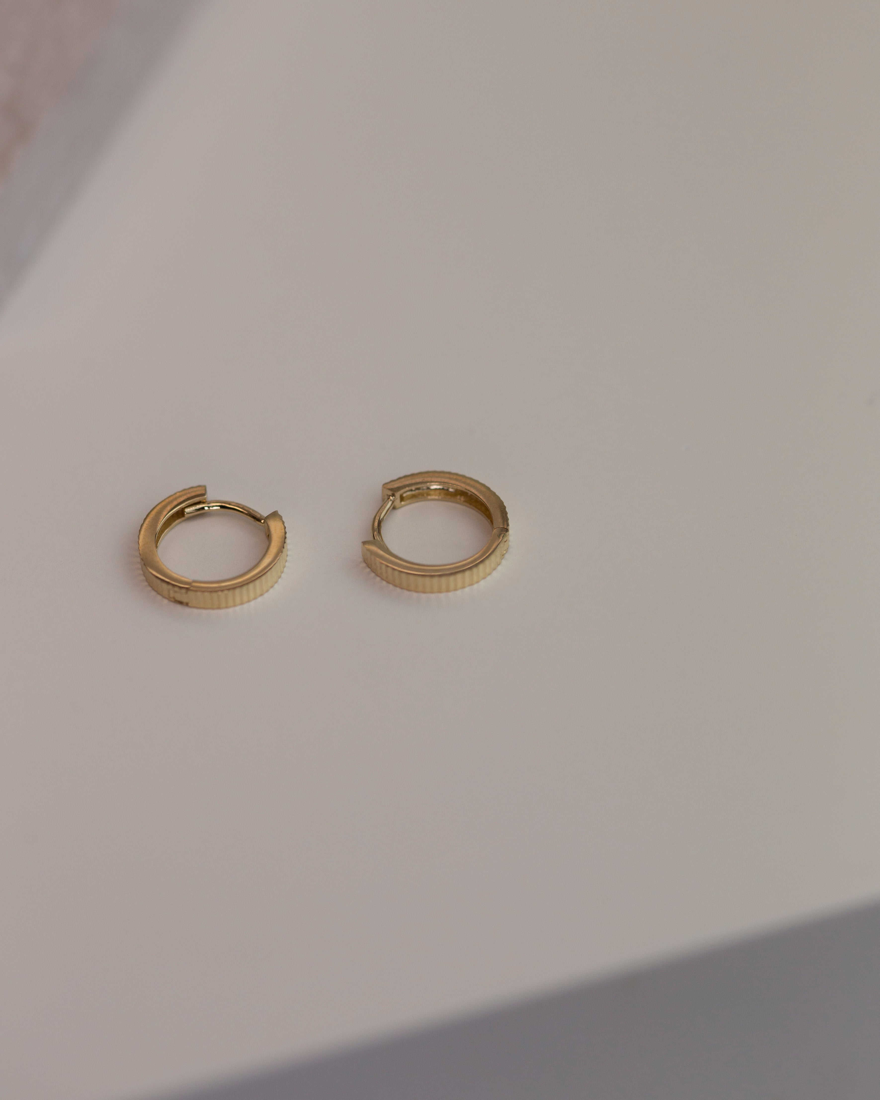 Beautiful gold Huggie Hoop Earrings