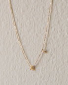 Personalized initial necklace with a diamond dangle