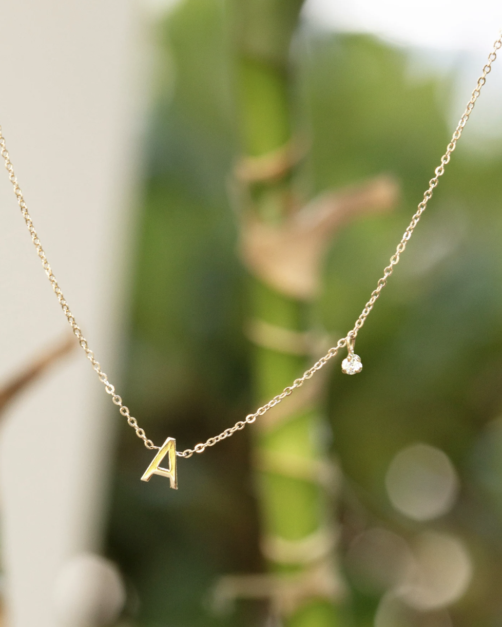 Personalized initial necklace with a diamond dangle