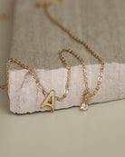 Personalized initial necklace with a diamond dangle